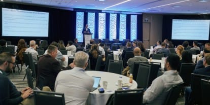 Vista general de los asistentes al East Coast Summit durante una ponencia
